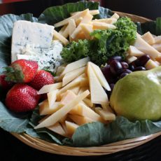 Cheese and fruit in a basket
